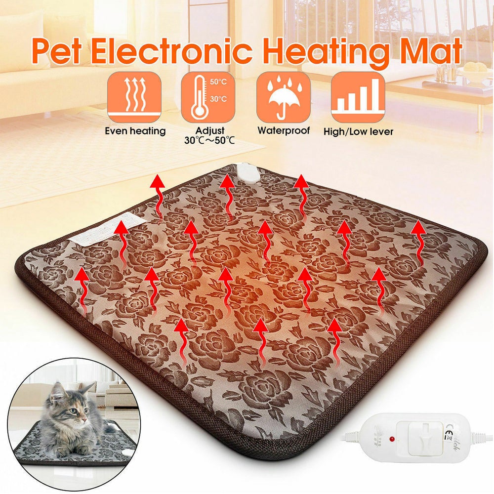 Pet electronic heating mat with floral pattern and control cable, shown in a home setting.