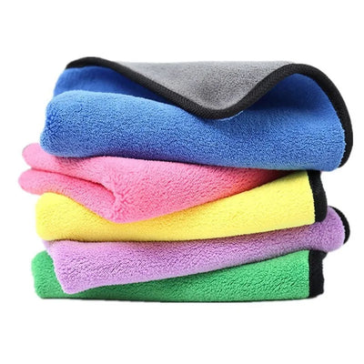 Stack of colorful microfiber towels on a white background