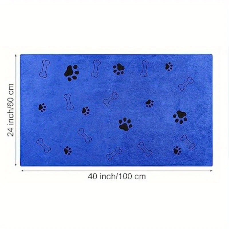 Blue mat with black paw and bone prints, dimensions indicated on a white background