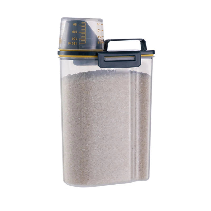 Clear container with lid filled with a grayish substance on a white background
