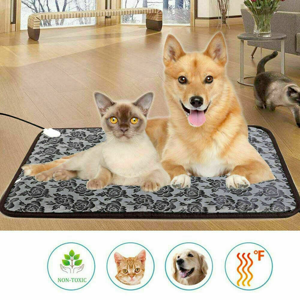 Cat and dog on a heating pad with icons indicating non-toxicity, pet safety, and temperature control.