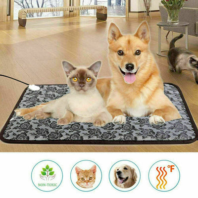 Cat and dog on a heating pad with icons indicating non-toxicity, pet safety, and temperature control.