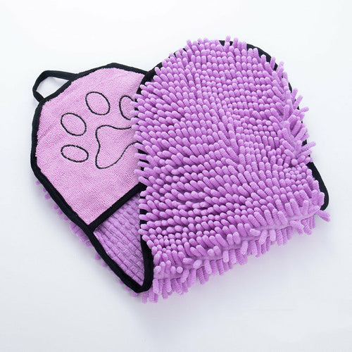 Purple microfiber cleaning mitt with paw print design on a white background