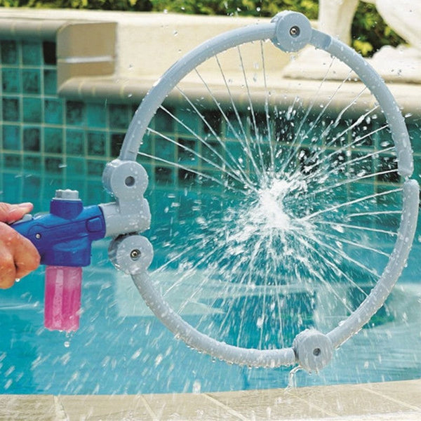 Water gun spraying water onto a pool with a circular water effect