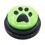 Green button with a black paw print design on a white background