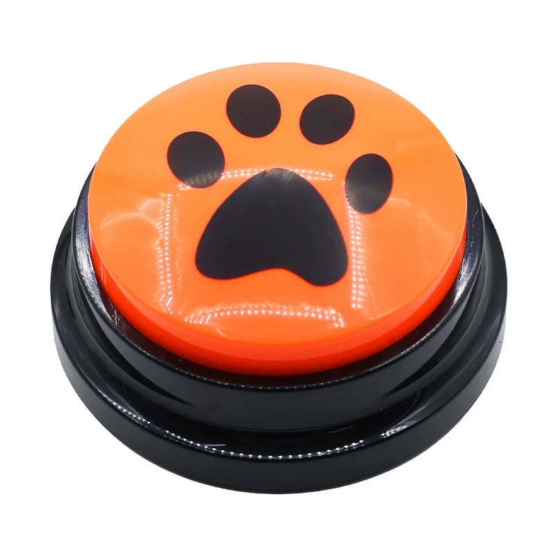 Orange button with a black paw print design on a white background