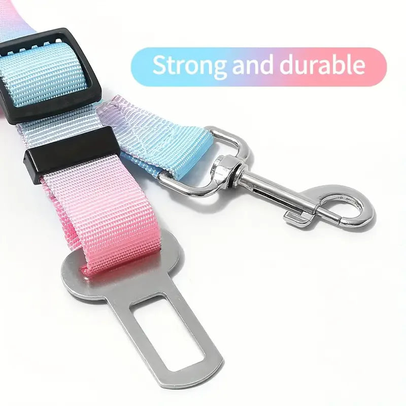 Pet car seat belt with gradient pink and blue straps on a white background