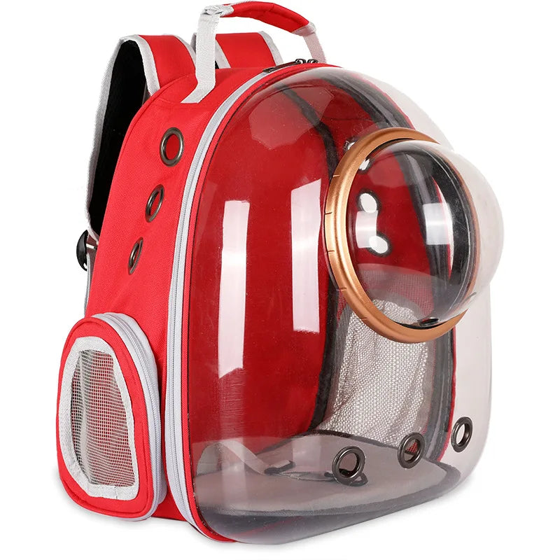 Red pet backpack with a clear front and gold accents on a white background