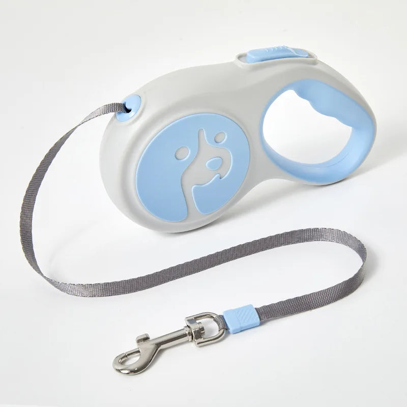 Retractable dog leash with gray strap and blue plastic handle on a white background