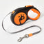 Retractable dog leash with orange and black handle on a white background