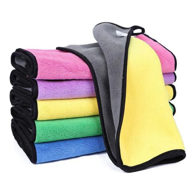 Set of colorful microfiber cloths with a carrying strap on a white background