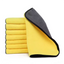 Set of yellow microfiber cloths with gray edges on a white background