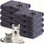 Stack of gray pet towels with paw and bone designs, featuring a dog and cat on a white background.