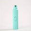 Turquoise water bottle on a light gray background