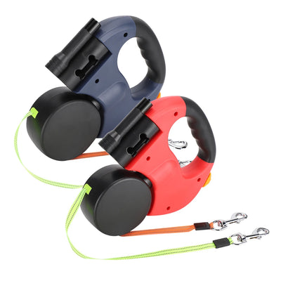 Two retractable dog leashes, one red and one blue, with attached leads on a white background.
