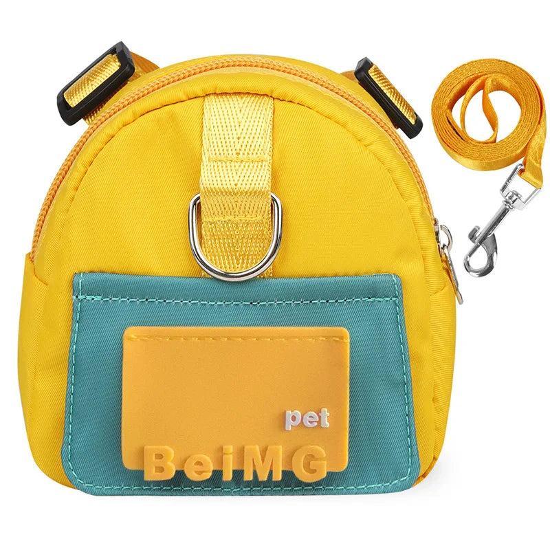 Yellow and teal pet bag with a leash on a white background