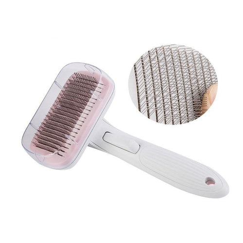Pet grooming brush with close-up of bristles on a white background